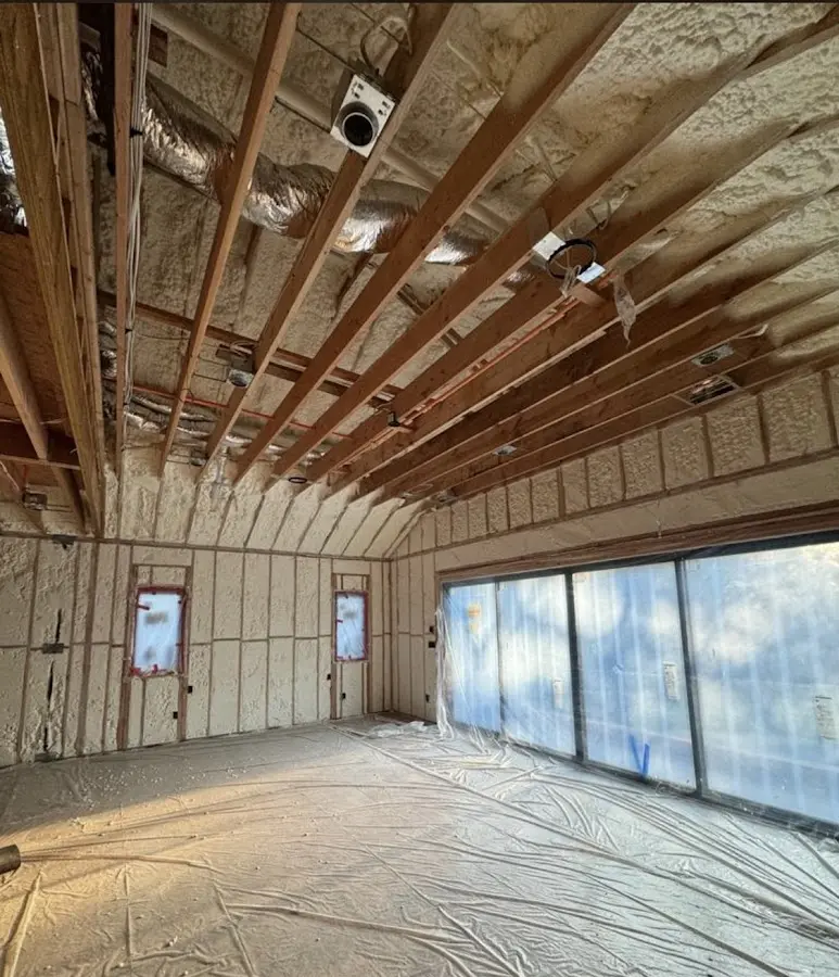 Interior walls and ceiling insulated with spray foam during new construction in Purcellville